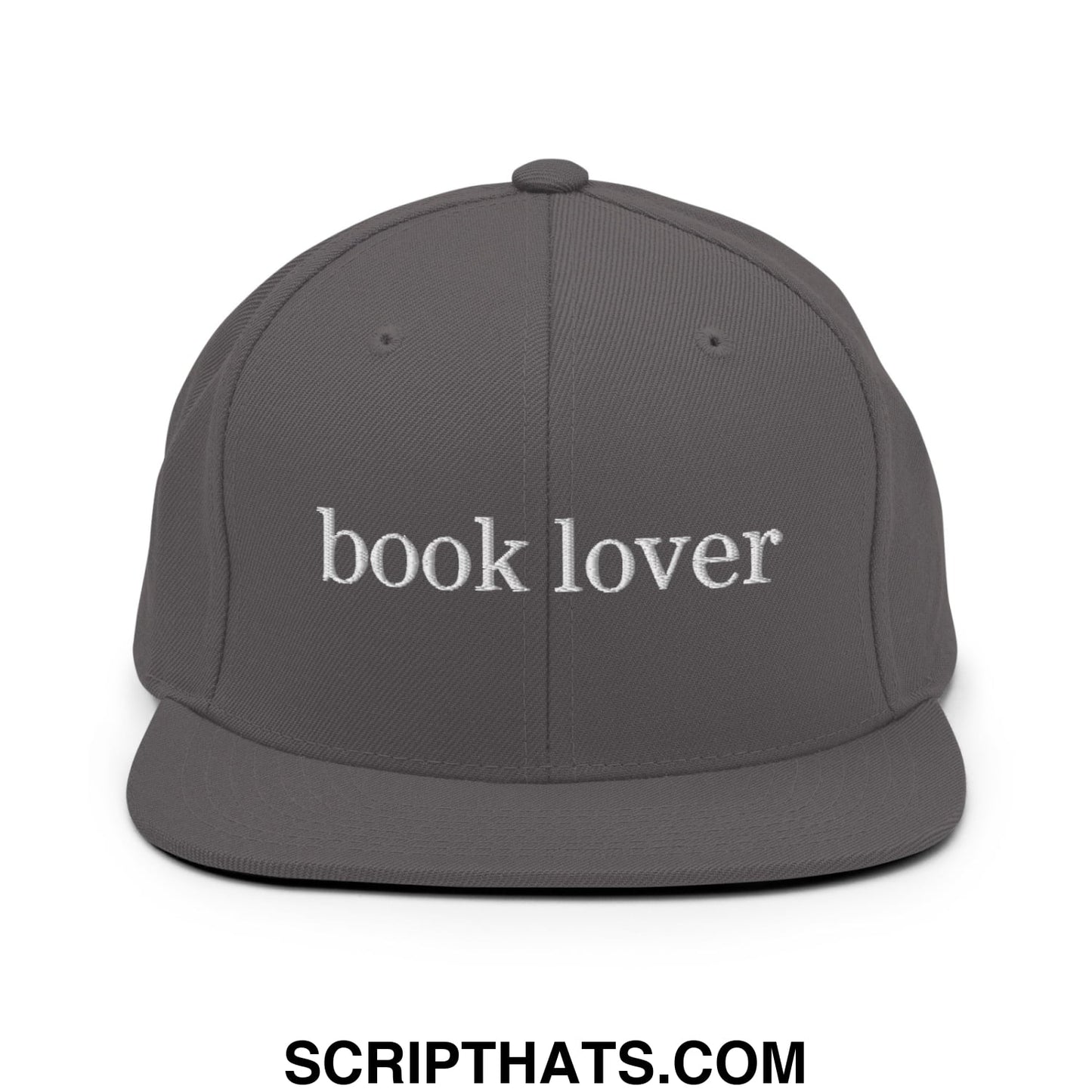 A dark gray snapback cap with book lover embroidered in white thread on the front flat bill brim hat
