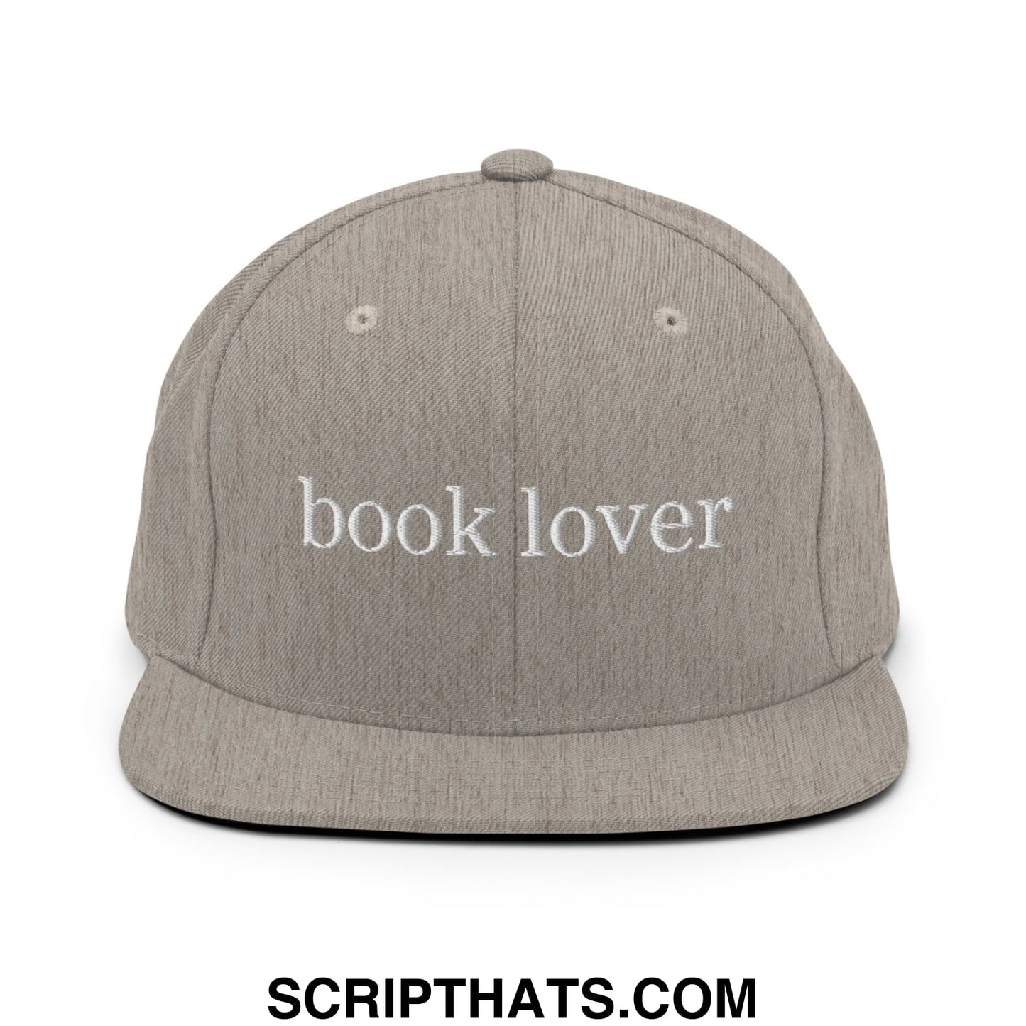 A gray snapback hat with book lover embroidered in white thread on the front, featuring a flat bill brim