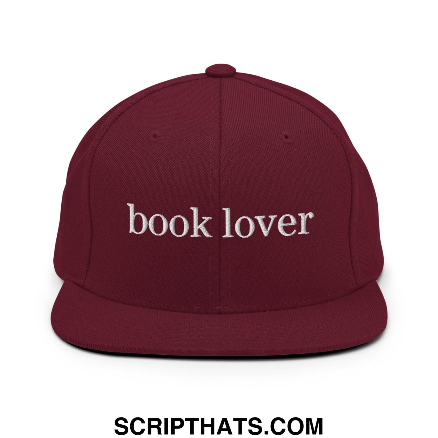 Maroon snapback cap with white embroidered book lover text and flat bill brim for casual wear