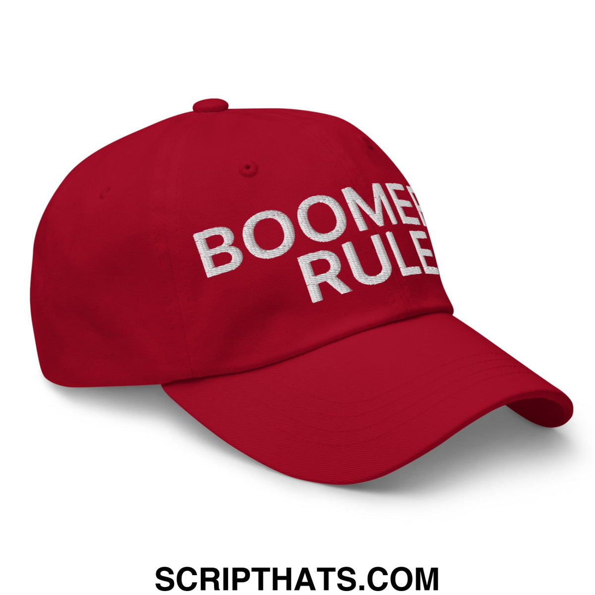 Red unstructured dad hat with white embroidered boomer rules text showcasing casual vintage style