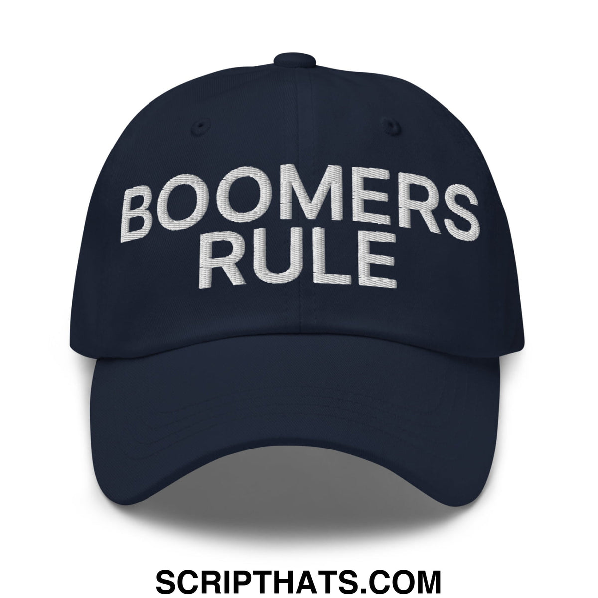 Navy blue unstructured dad hat with boomers rule embroidered in white thread across the front