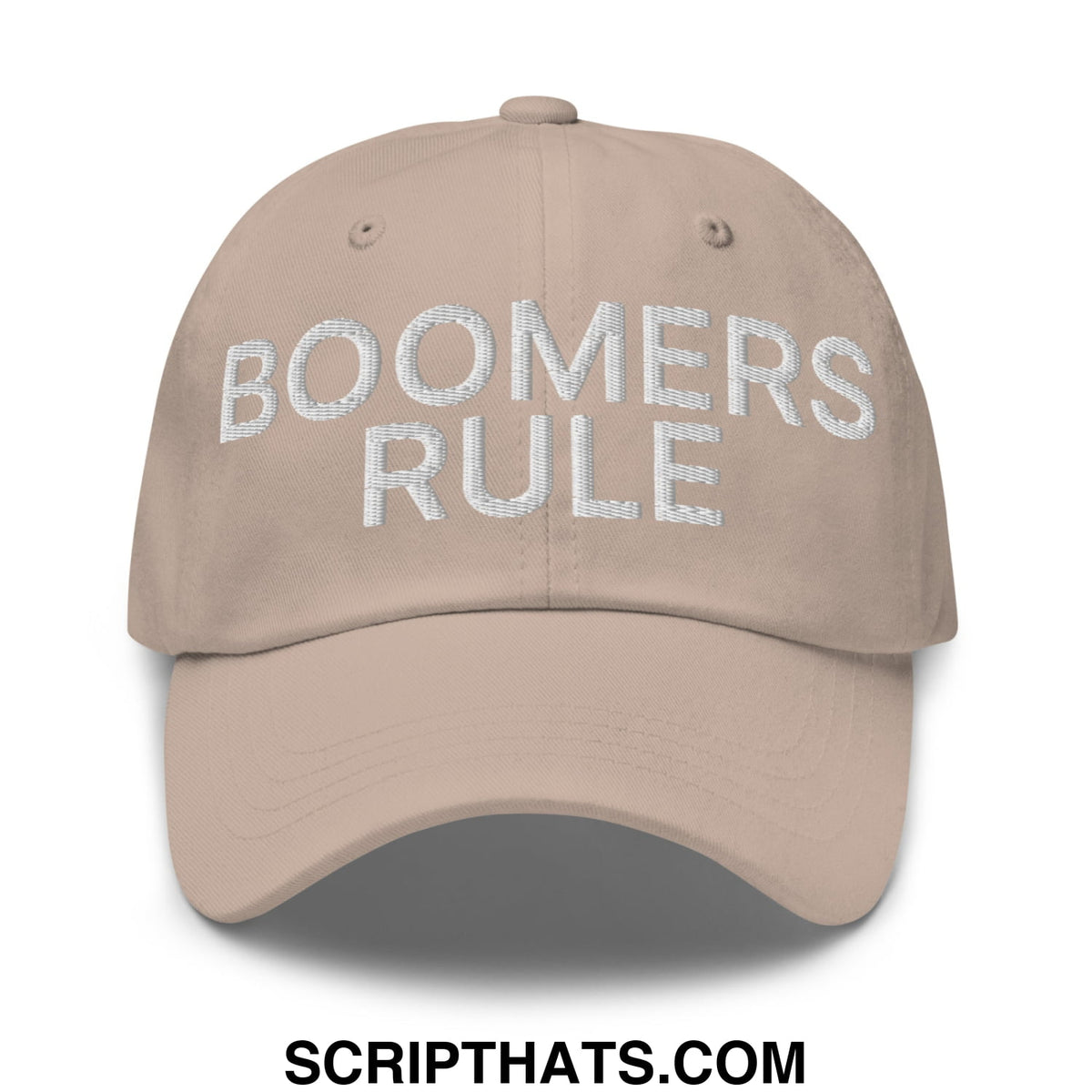 Beige unstructured dad hat with boomers rule embroidered in white thread across the front
