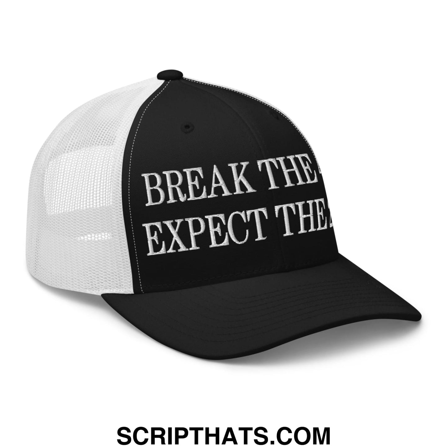 Black and white mesh trucker hat with embroidered break the expect text in bold capital letters
