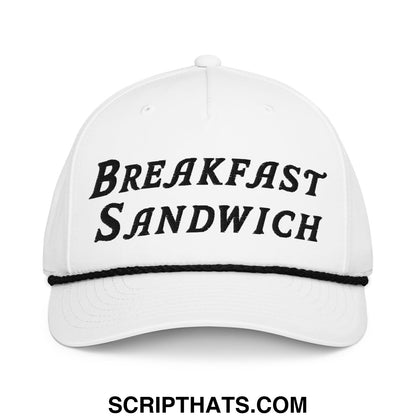 White baseball cap with black embroidered breakfast sandwich text and matching black brim trim for golf use