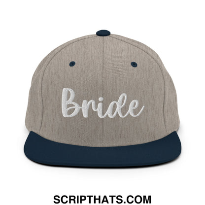Beige and navy blue snapback hat with bride embroidered in white cursive flat bill brim style