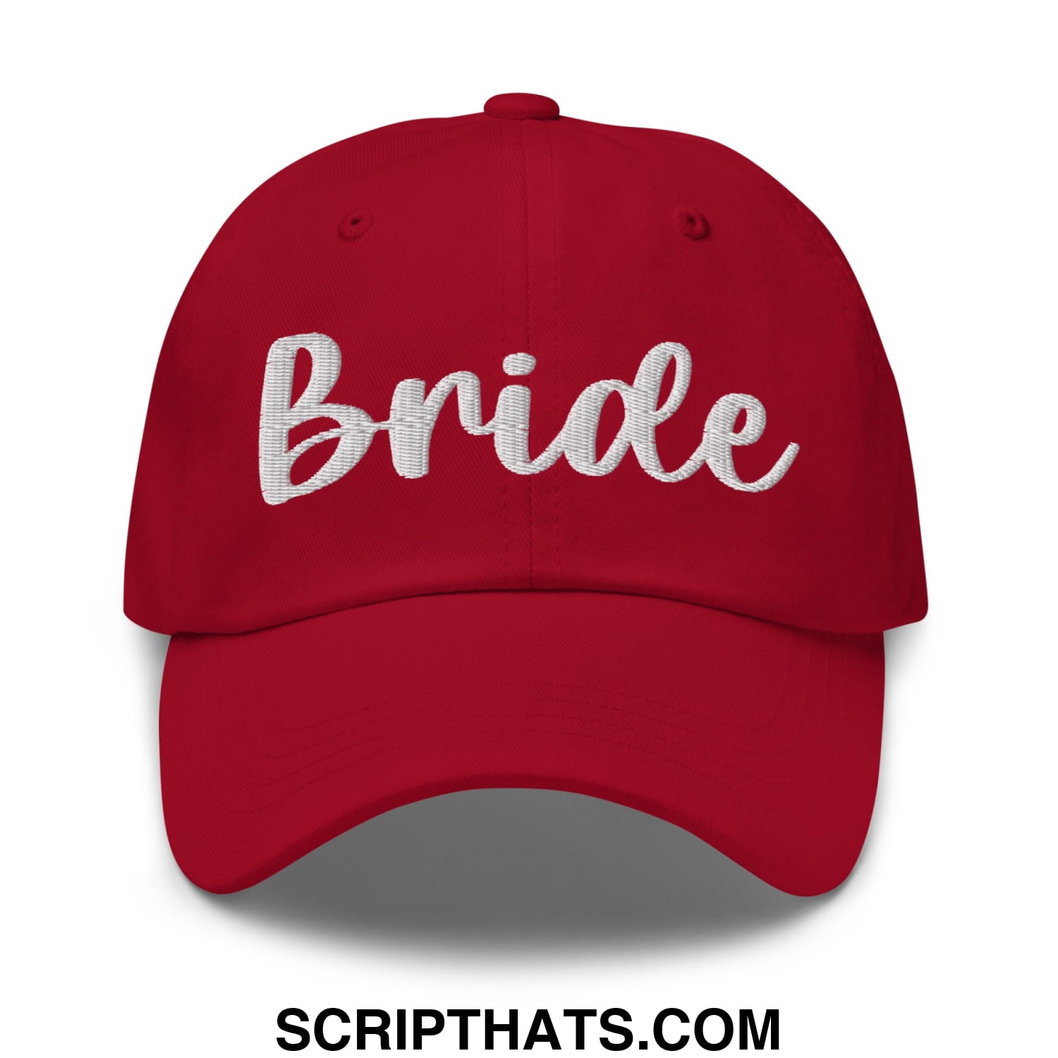 Red unstructured dad hat with white bride embroidered script on front perfect for wedding celebrations