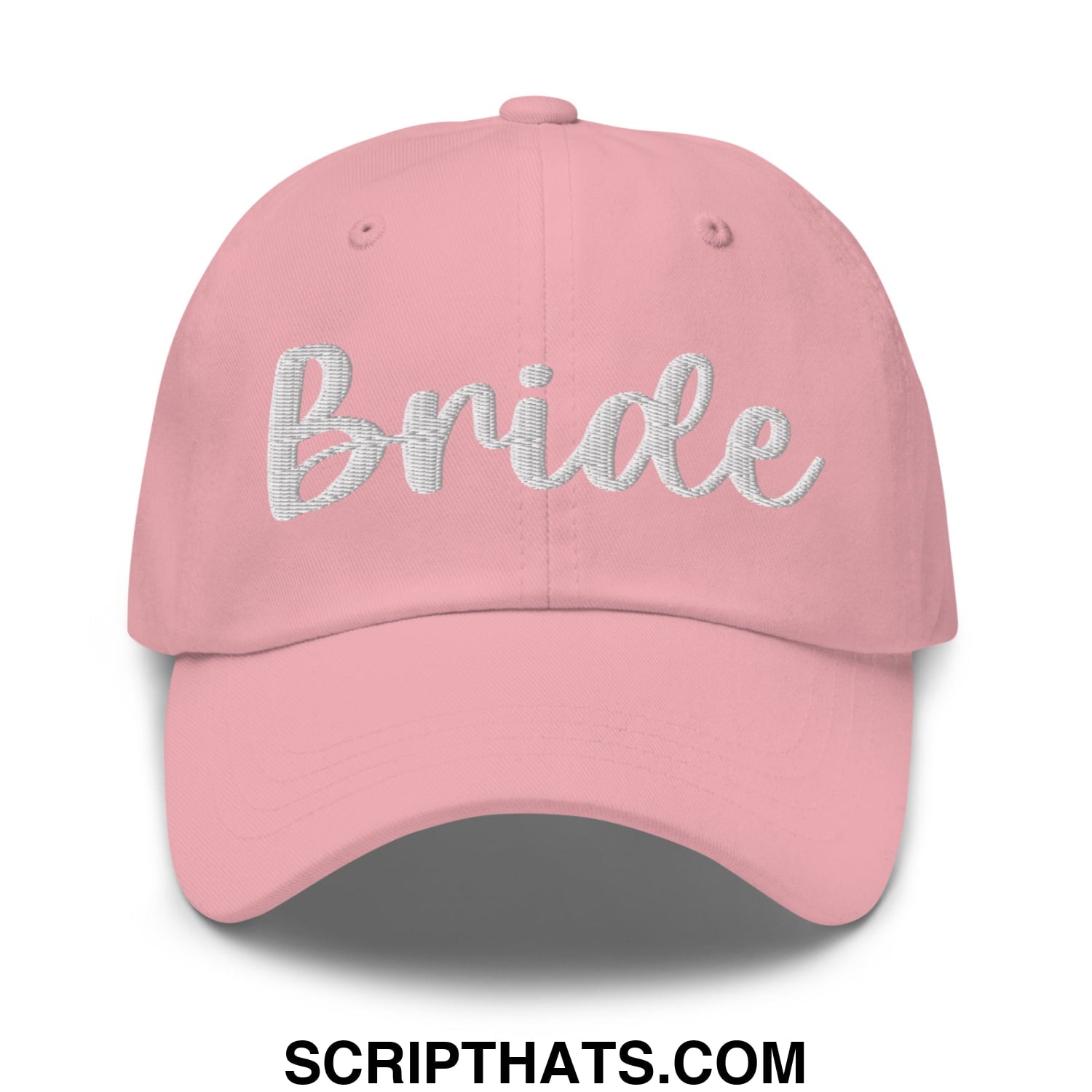 A soft pink unstructured dad hat with bride embroidered in delicate silver script perfect for bridal wear