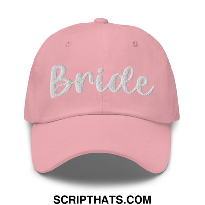 A soft pink unstructured dad hat with bride embroidered in delicate silver script perfect for bridal wear