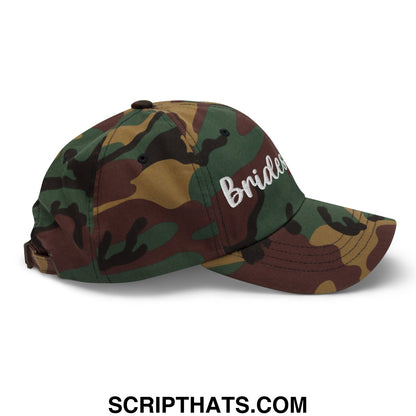A camouflage bridesmaid embroidered unstructured dad hat with white script embroidery on the front