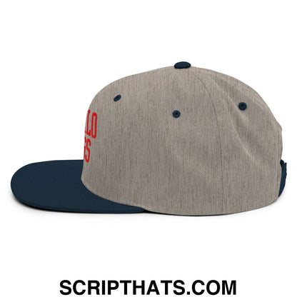 A gray and navy blue snapback hat with red buffalo wings chicken wings embroidered lettering on the side