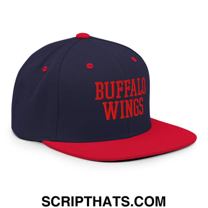 Navy blue and red snapback hat with buffalo wings embroidered in bold red on the front flat bill brim design