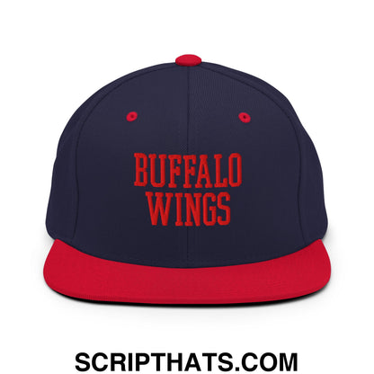 Navy blue and red snapback hat with buffalo wings embroidered in bold red on a flat bill brim design