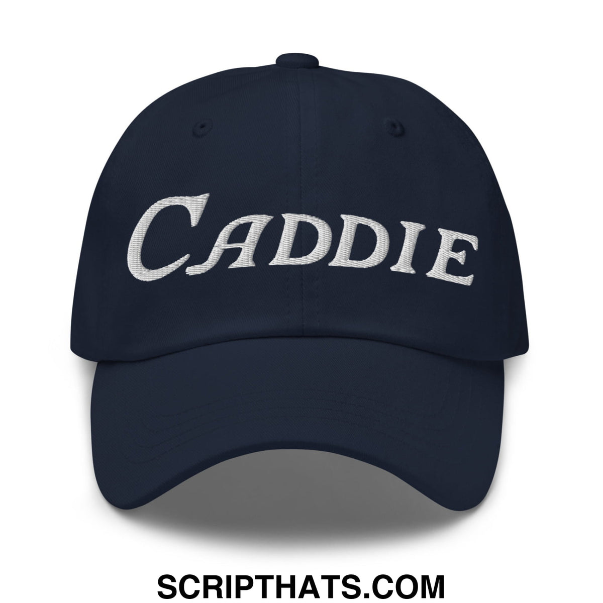 Navy blue unstructured golf dad hat with white embroidered caddie in cursive script on the front