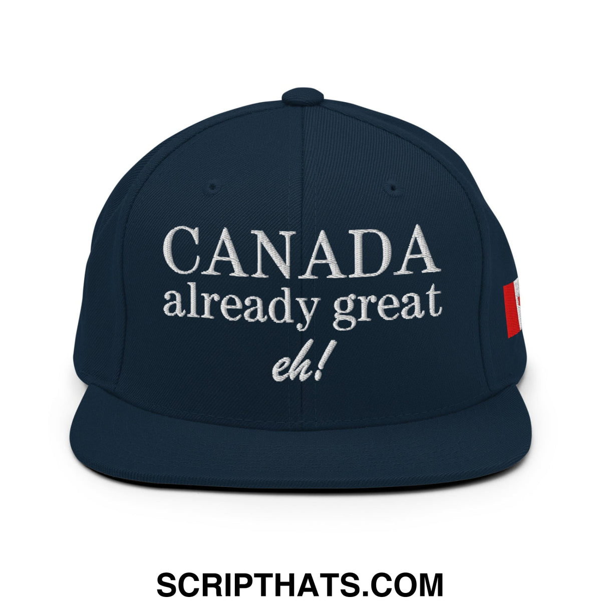 Dark blue snapback hat with white canada already great eh embroidered text and red canadian flag patch on the side