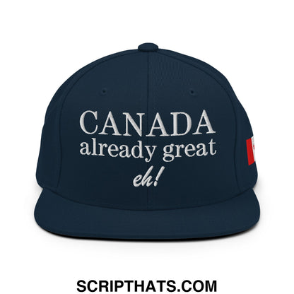 Dark blue snapback hat with white canada already great eh embroidered text and red canadian flag patch on the side