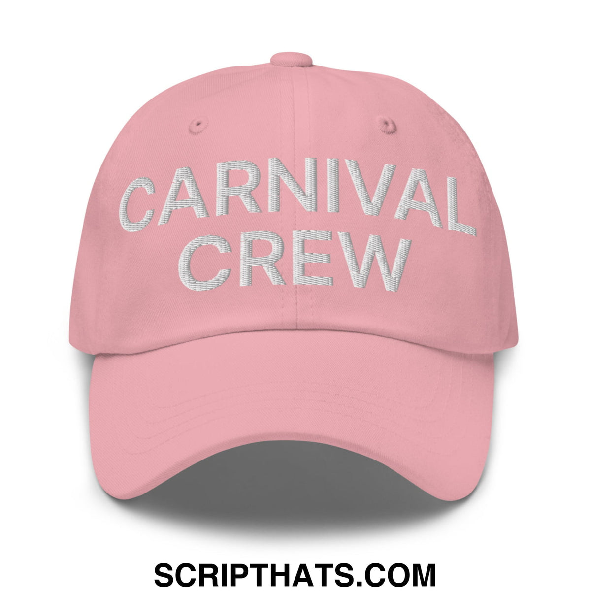A soft pink unstructured dad hat with carnival crew embroidered in shimmering silver thread on the front