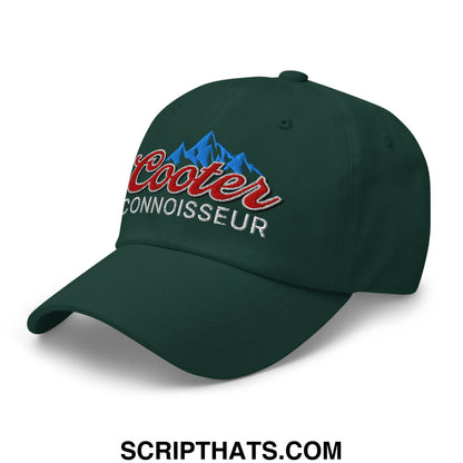 Dark green unstructured dad hat with embroidered cooter connoisseur logo in red script and blue mountain design