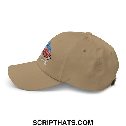 Tan unstructured dad hat featuring cooter connoisseur embroidered logo with red script and blue mountain design