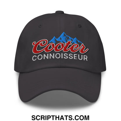Dark gray unstructured dad hat with embroidered cooter connoisseur logo in red script and blue mountain design