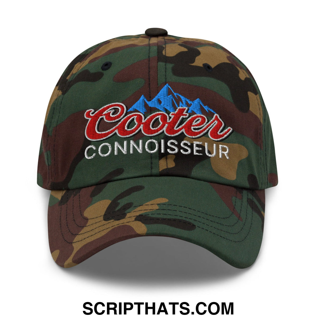 A camouflage dad hat with an embroidered red and white cooter connoisseur logo above a blue mountain design