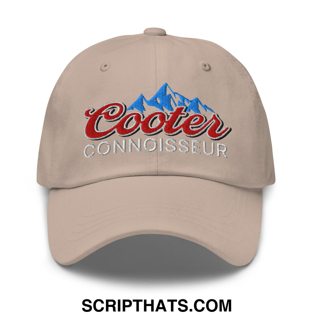 Beige unstructured dad hat featuring embroidered cooter connoisseur logo with red script and blue mountain design