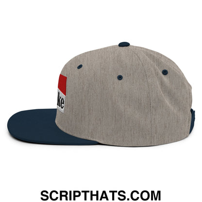 Gray and navy blue cowpoke snapback hat with red white and black embroidered logo on the side and flat bill brim