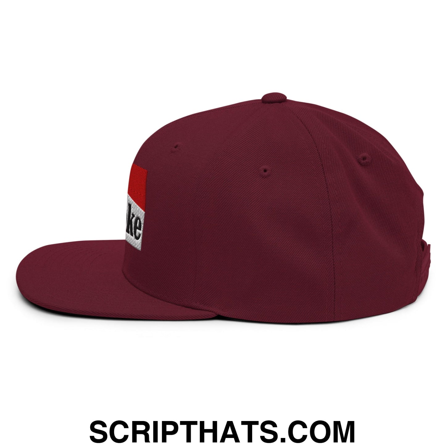 Maroon cowpoke embroidered flat bill snapback hat with rectangular patch in red white and black embroidery