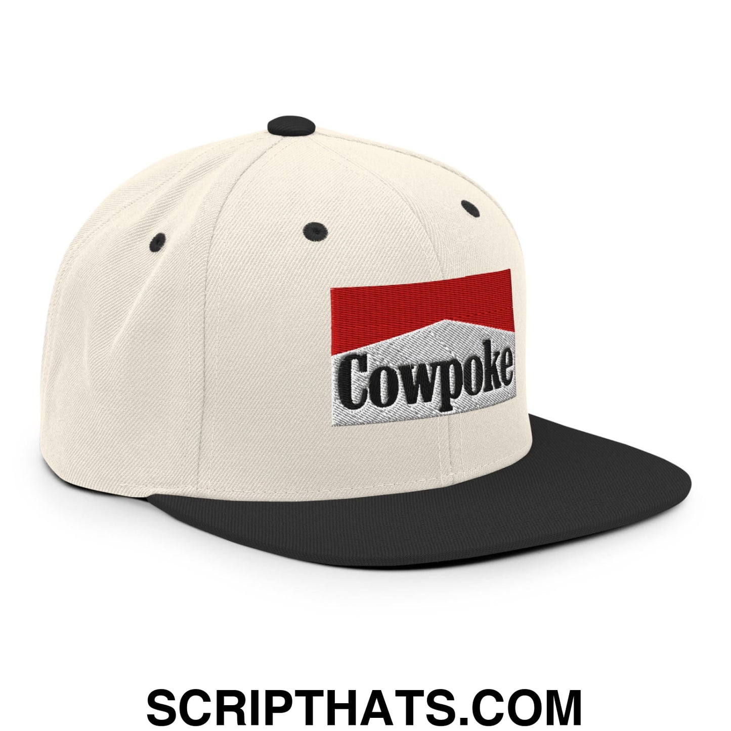 Cream-colored snapback hat with black flat bill brim and embroidered cowpoke logo on red and white patch