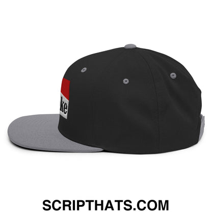 Black and gray cowpoke embroidered flat bill brim snapback hat with red and white rectangular side patch
