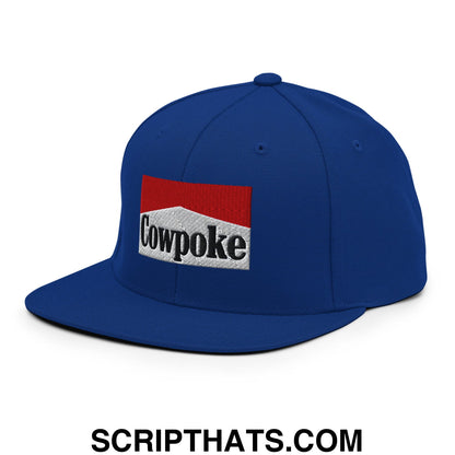 Royal blue snapback hat with a flat bill brim featuring a red and white embroidered Cowpoke logo with black lettering