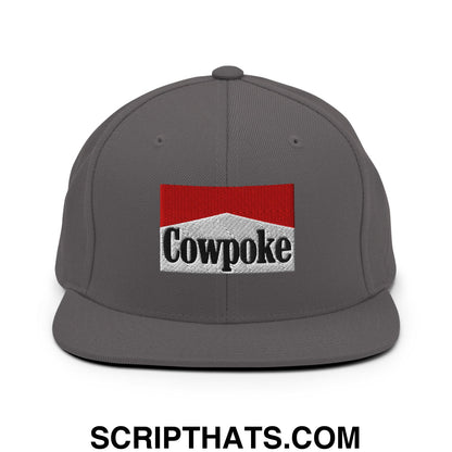 Gray snapback cap with embroidered red and white cowpoke logo inspired by marlboro cigarette design