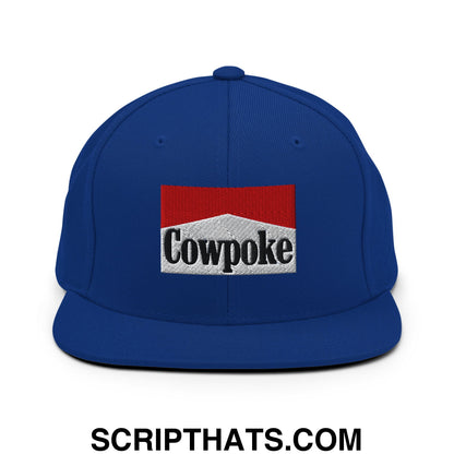 Royal blue snapback hat with flat bill featuring embroidered cowpoke logo in red and white marlboro style design