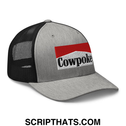 Gray and black mesh trucker hat with red and white embroidered cowpoke logo on the front panel