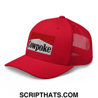 Red mesh trucker hat featuring a white and black embroidered cowpoke logo on the front panel