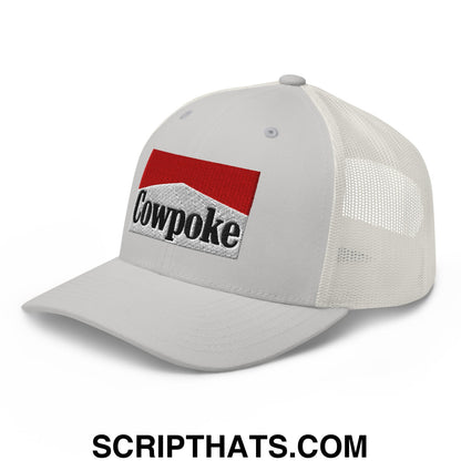 White mesh trucker hat with red and silver embroidered cowpoke logo on the front panel