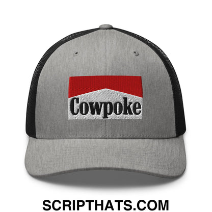 Gray mesh trucker hat with black back and red and white embroidered cowpoke logo branded front panel