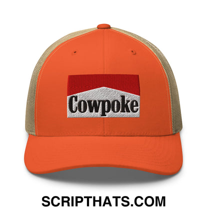 Orange and beige mesh trucker hat with red white and black embroidered cowpoke logo front panel