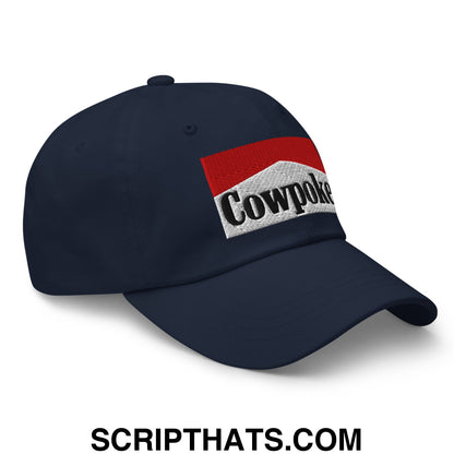 Navy blue unstructured dad hat featuring an embroidered cowpoke logo with red and white rectangular design