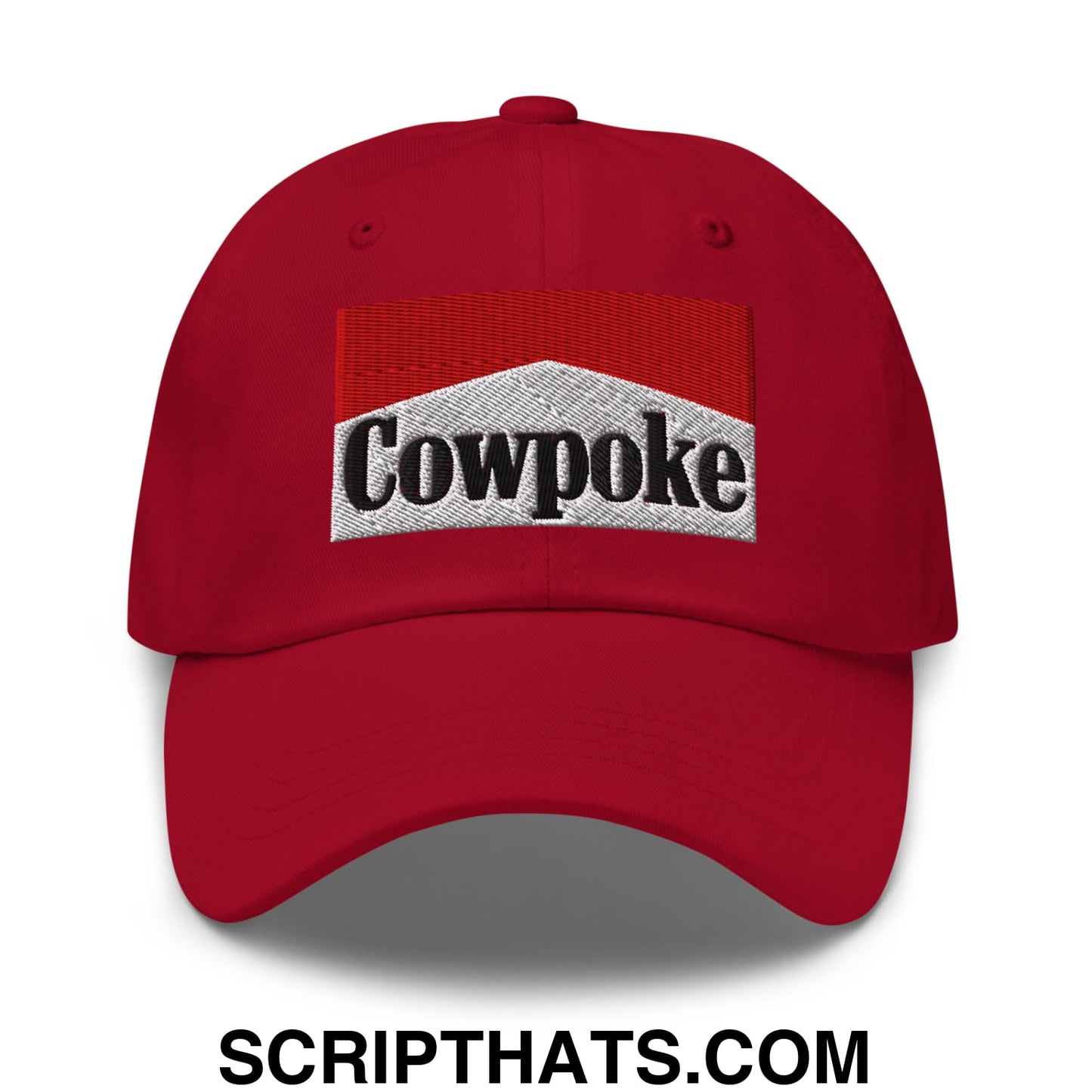 Red unstructured dad hat featuring a silver patch with embroidered cowpoke logo and red and white stripes