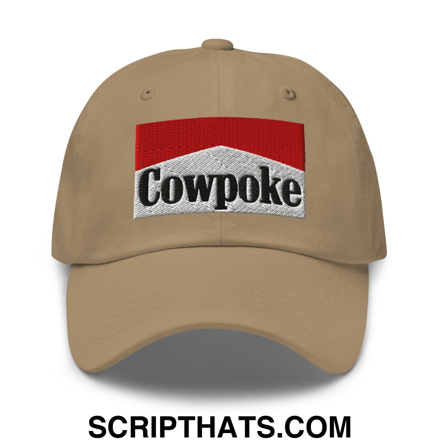 Beige unstructured dad hat featuring an embroidered cowpoke logo with red and silver design on the front