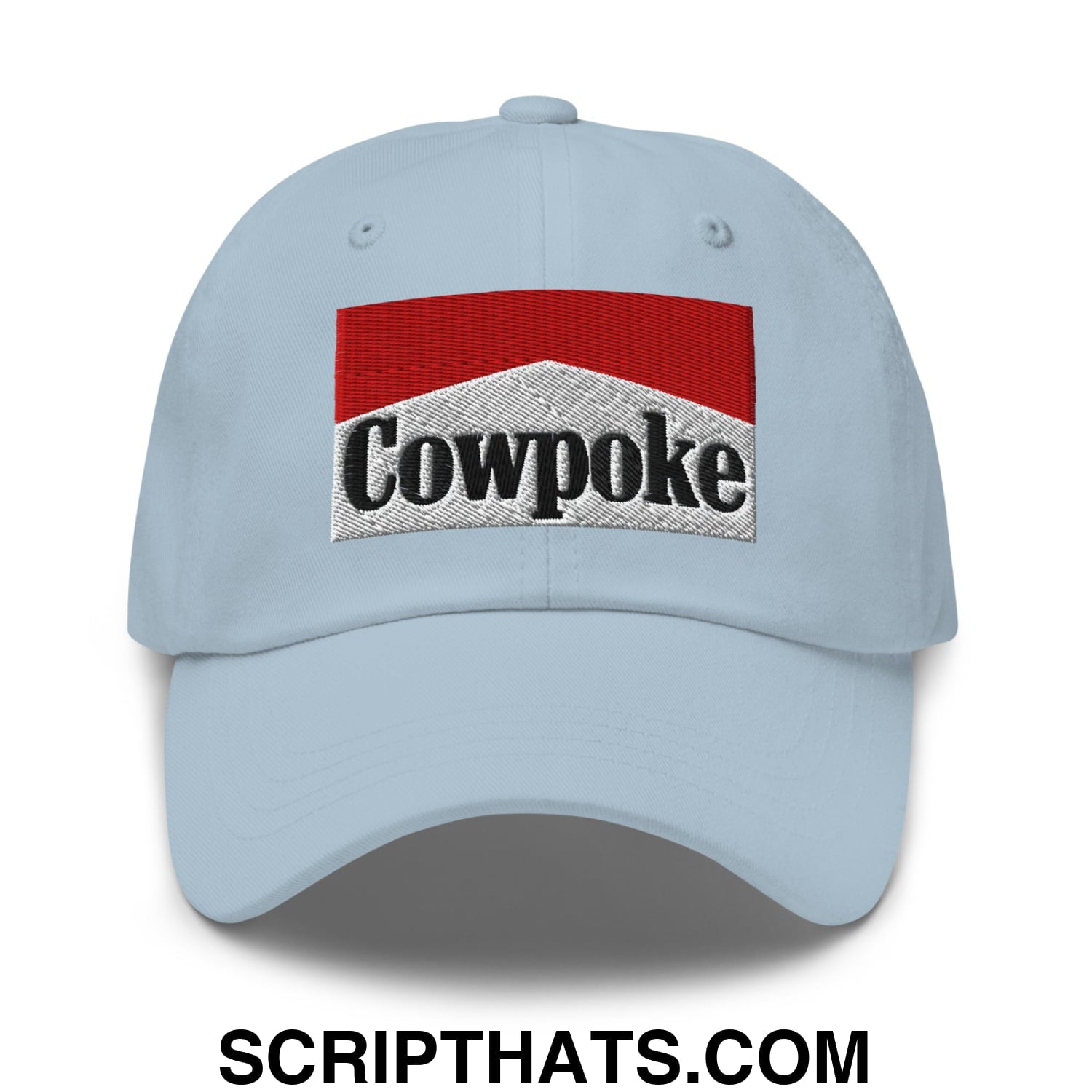 Light blue unstructured dad hat with embroidered red and silver cowpoke logo inspired by Marlboro design