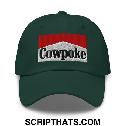 Dark green unstructured dad hat with cowpoke embroidered logo in red white and black on front panel