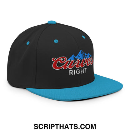 Black and teal snapback hat with flat bill brim and red embroidered curves right logo over blue mountain design