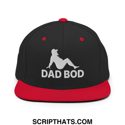 Black and red snapback hat with white embroidered dad bod text and mud flap silhouette on flat bill brim