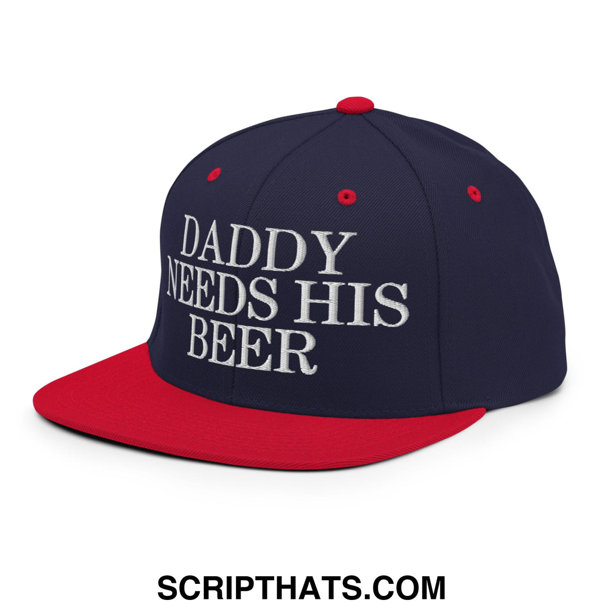 Navy blue and red snapback cap with white embroidered text daddy needs his beer featuring a flat bill brim design