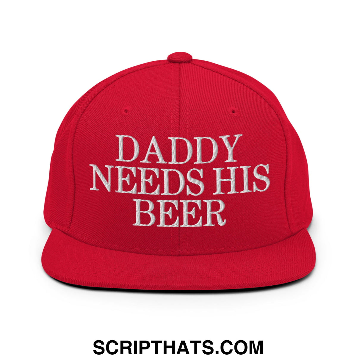 Red snapback cap with white embroidered daddy needs his beer text featuring a flat bill brim design