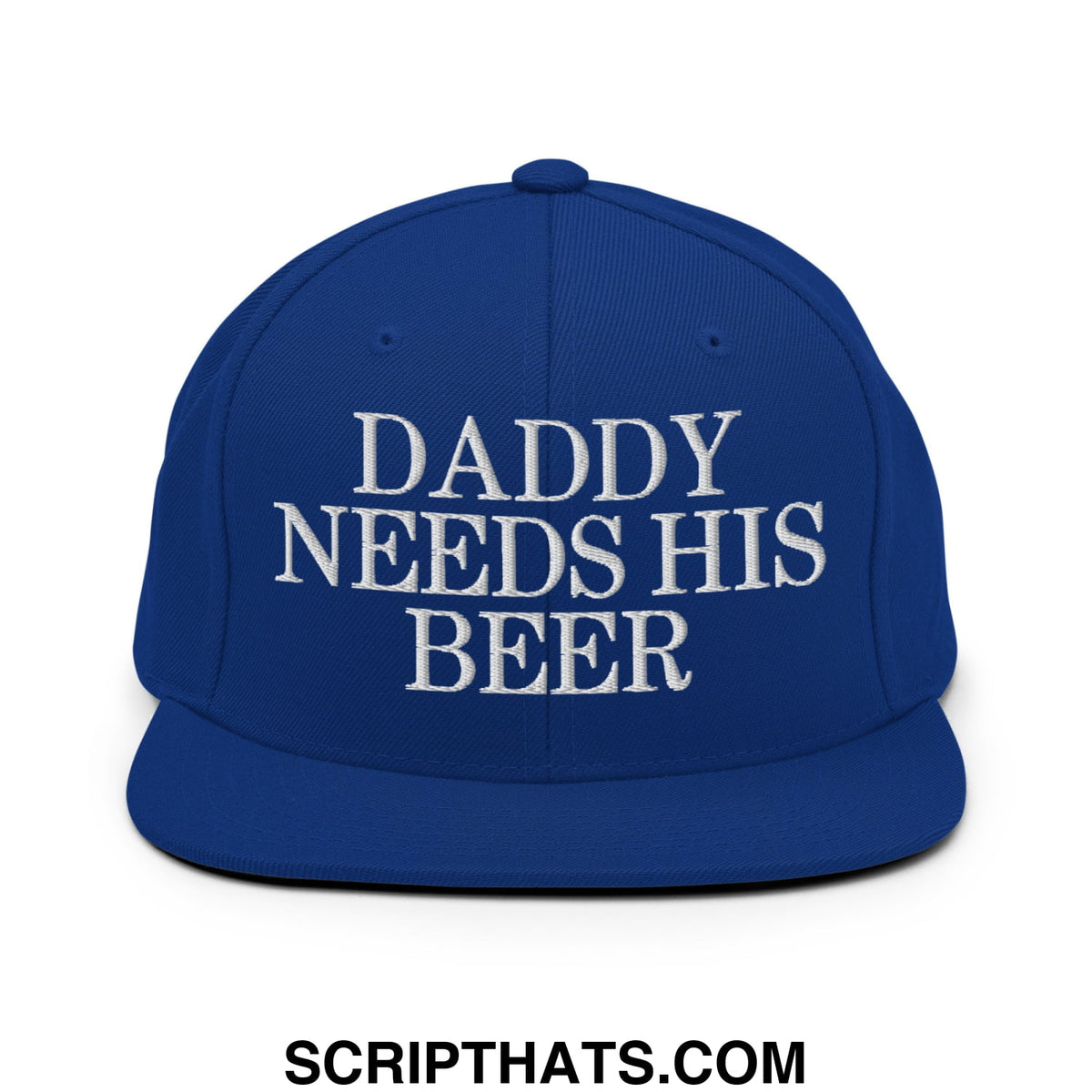 Royal blue snapback hat with white embroidered daddy needs his beer text and flat bill brim design