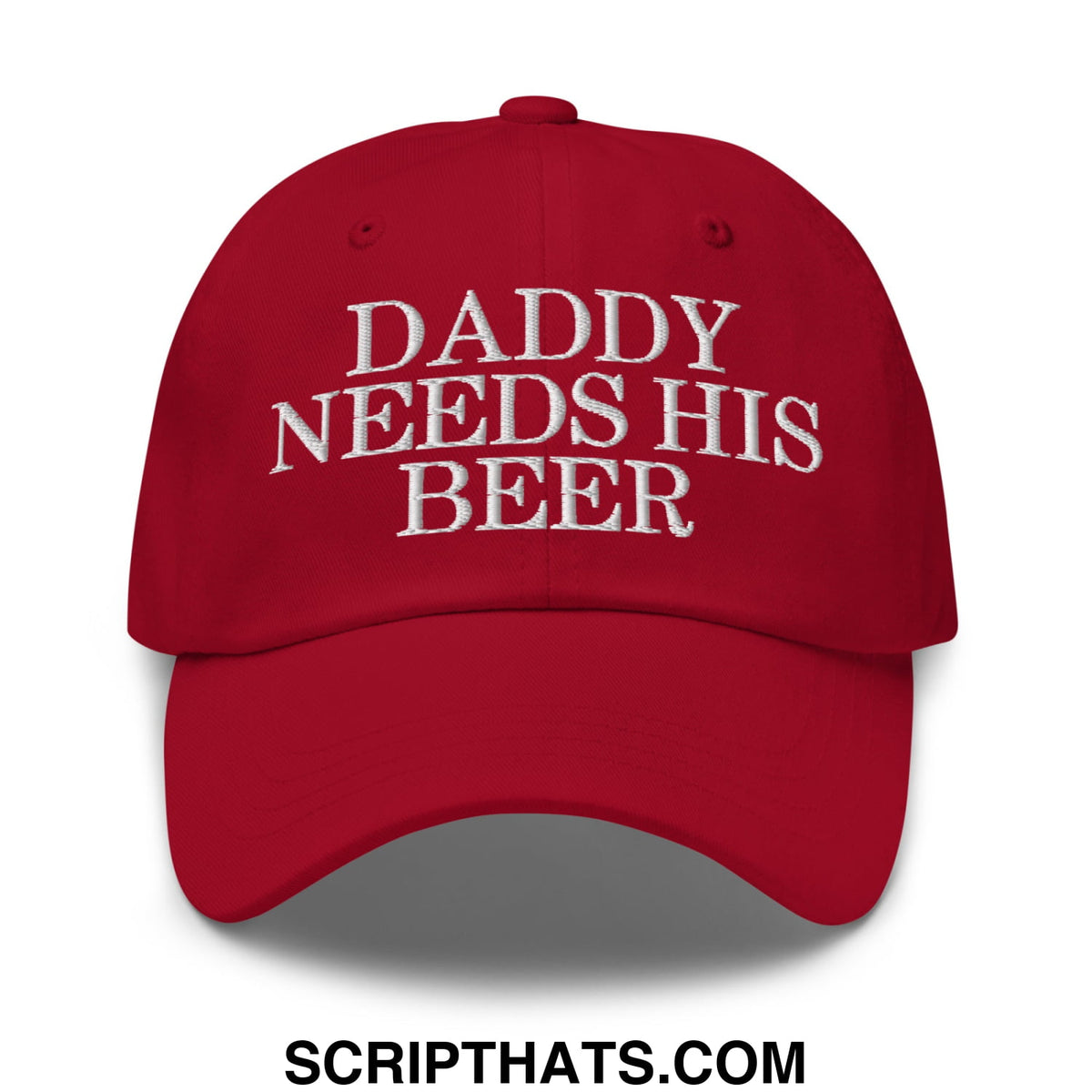 Red embroidered unstructured dad hat with white text daddy needs his beer for casual outdoor use