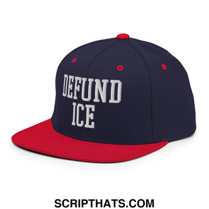 Navy blue and red flat bill snapback hat with white embroidered defund ice text front for casual wear