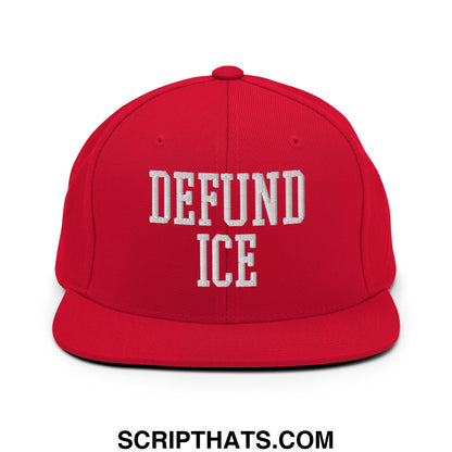 Red snapback cap with white embroidered defund ice text and flat bill brim in a bold streetwear style